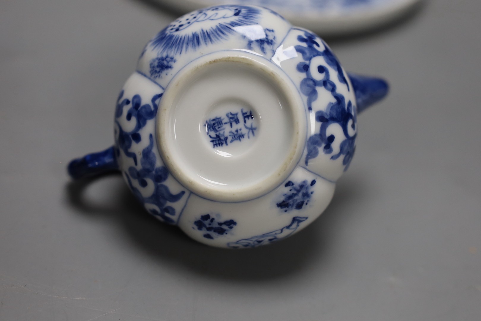 A Chinese blue and white miniature teapot, 6 matching cups and a tray and a box of five vases